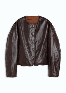 Brown leather jacket on a white background